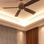 Modern bedroom interior with stylish LED strip lights, ceiling lighting, and warm ambient illumination