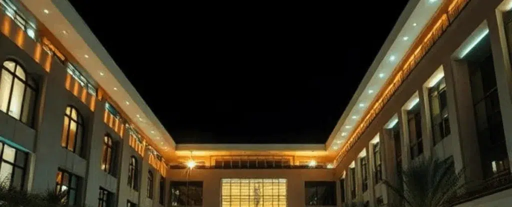 Modern university campus in the UAE illuminated with energy-efficient LED lighting for classrooms, pathways, libraries, and academic buildings