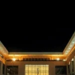 Modern university campus in the UAE illuminated with energy-efficient LED lighting for classrooms, pathways, libraries, and academic buildings