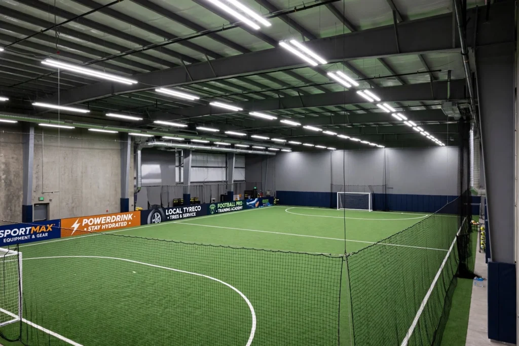 LED high bay lighting installed in a large sports arena