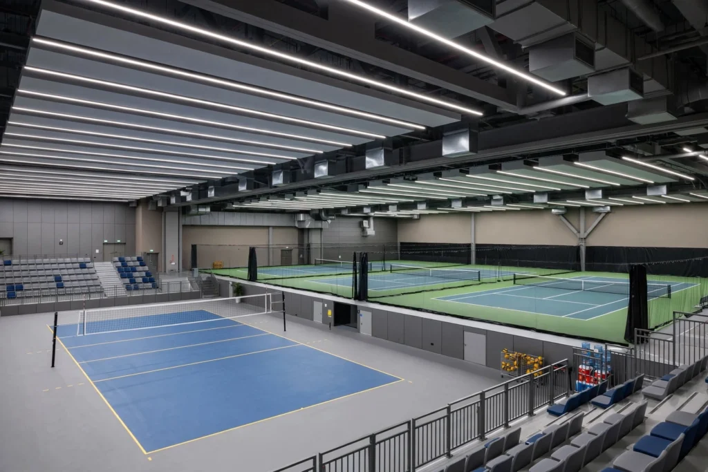 Bright LED lighting across a modern indoor sports hall